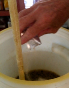 Packet of yeast being added to the barrel