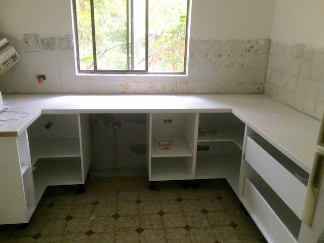 Some cabinets and the bench tops have been installed